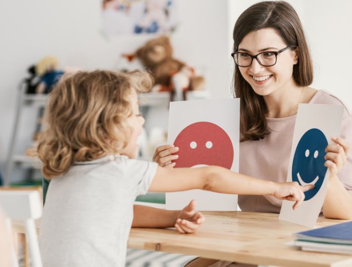 Teacher engaging with a child