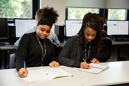 Two students working in the LRC