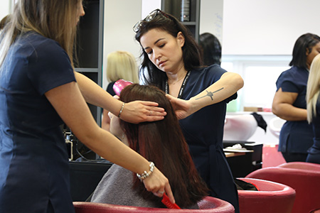 Student styling hair 